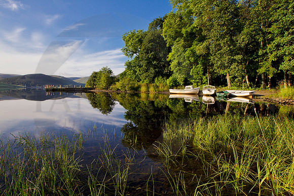 Boat reflections on St Marys loch