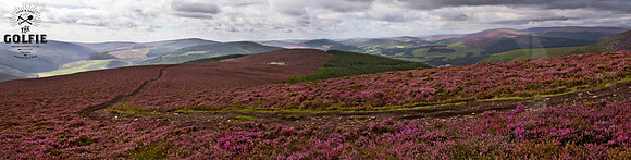 Large panoramic view down over Innerleithen looking up Traquair valley